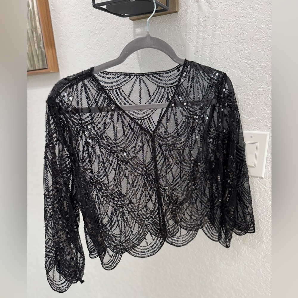 One size sequin capelet.